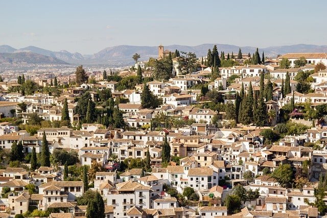 Exploring the Iconic Alhambra Palace. As you step into the Alhambra Palace Granada, you're taken back to a time of Moorish splendor. This grand building shows Granada's rich history and beauty.