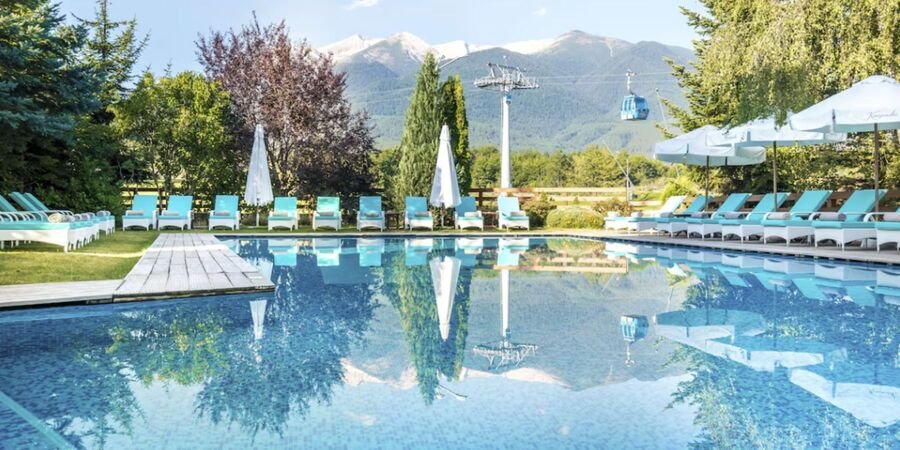 Kempinski Hotel Grand Arena Bansko. Located in the heart of Bulgaria's most famous ski resort, Kempinski Hotel Grand Arena Bansko is a haven of luxury and relaxation. This alpine gem combines five-star service with breathtaking views of the Pirin Mountains.