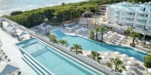 Set right on the fine sands of Playa de Muro, this resort invites families to relax and play with beachfront access, a water park, and age-specific children’s clubs. Highlights include live evening entertainment, healthy food options, and connecting rooms for bigger groups.