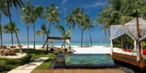 Unlike most Maldivian resorts, One&Only Reethi Rah offers expansive, family-friendly villas that still maintain an intimate vibe. From spacious overwater villas to pools for endless family fun, this resort caters to various travel styles. It’s perfect for multigenerational families, couples, or even solo travelers looking for room to breathe. The amenities range from tailor-made activities for kids to champagne on the beach for adults. Bold, beautiful, and endlessly elegant—this is where memories are made.