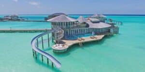 Soneva Jani is the epitome of luxury, showcasing some of the Maldives’ most iconic overwater villas. Imagine waking up in a villa where a retractable roof allows you to sleep under the starlit sky. It’s perfect for a romantic evening or a solo night of serenity. The resort values sustainability—with eco-friendly architecture and locally sourced décor adding to its charm. Few places compare when it comes to both elegance and harmony with nature. If you’re planning your dream honeymoon, this is a destination straight out of a fairy tale.
